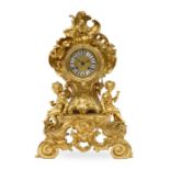 A French Gilt Metal Striking Mantel Clock, circa 1890, Rococo Style case flanked by figures and