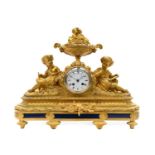 A French Gilt Bronze Striking Mantel Clock, circa 1890, case surmounted with an urn finial and a