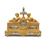 A French Bronze Ormolu Striking Mantel Clock, circa 1890, case with a central urn shaped porcelain