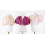 Circa 1930-40s Evening Jackets comprising a plum coloured down feather mounted evening bolero with
