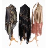 Early 20th Century Shawls comprising a gold and pink lamé semi-circular shawl with pink fringing