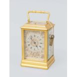 A French Brass Strike and Repeat Carriage Clock, circa 1890, case with carrying handle and repeat