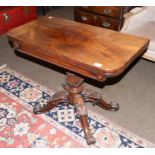 A Victorian Mahogany Fold Over Tea Table, with carved base