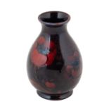 William Moorcroft (British, 1872-1945): A Flambé Big Poppy Pattern Vase, impressed MADE IN ENGLAND