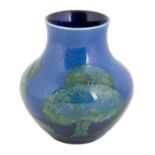 William Moorcroft (1872-1945): A Moonlit Blue Landscape Pattern Vase, painted with trees,