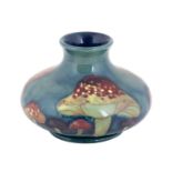 William Moorcroft (1872-1945): A Claremont Toadstool Pattern Vase, blue painted monogram,