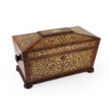 A Regency Rosewood Brass Inlaid Tea Caddy, circa 1830, with turned mouldings and handles and on