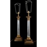 A Pair of Brass-Mounted Glass Table Lamps, 20th century, of Corinthian column form, with moulded