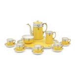 An Aynsley Porcelain Cabaret Service, early 20th century, yellow ground, gilded and painted with