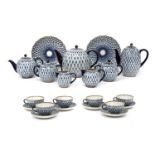 A Lomonosov Porcelain Tea Service, 20th century, with blue and gilt lattice pattern, red printed