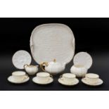 A Belleek Porcelain Cabaret Tea Set, 19th century, comprising: 1 cabaret tray 1 teapot and cover 1
