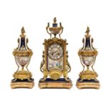 A French Gilt Metal Porcelain Striking Mantel Clock Garniture, retailed by Durden, Fenchurch St,