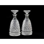A Pair of Cut-Glass Spirit Decanters and Stoppers, 19th century, with all over hobnail cutting 29.