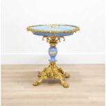 A Gilt-Metal-Mounted Sèvres-Style Porcelain Centre Table, circa 1870, the oval top painted with