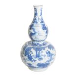 A Chinese Porcelain Double Gourd Vase, Chongzhen style, painted in underglaze blue with figures