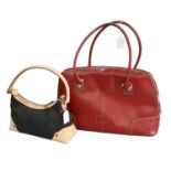 A Mulberry Scotchgrain Black Leather Nevada Handbag, with cream leather mounts and trims, and