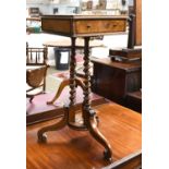 A Victorian Burr Walnut Work Table, the moulded square top fitted with opposing drawers, on three