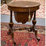 A Victorian Burr Walnut Oval Work Table, with turned supports, 51cm by 45cm by 71cm