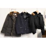 A Brown Barbour Wax Coat with Faux Fur Collar, together with a further navy Barbour coat and a black
