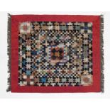 19th Century Silk Patchwork comprising a central square with an 8 point star to the centre,