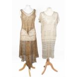 Circa 1920s 'Assuit' Evening Dress on white cotton net ground with capped sleeves, scooped neckline,