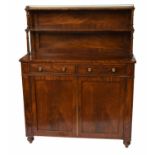 A Regency Mahogany Chiffonier, the shelved superstructure with pierced brass gallery, over two short