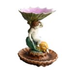 A Victorian Majolica Pottery Pedestal Fruit Bowl, possibly Holdcroft, as an oversized shell,