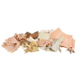 Early 20th Century Undergarments comprising a cream lace bandeau bra, four pale pink silk, cotton