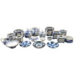 A Collection of Japanese Arita Porcelain, decorated in underglaze blue, including pierced candle