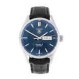 Tag Heuer: A Stainless Steel Day/Date Automatic Centre Seconds Wristwatch, signed Tag Heuer,