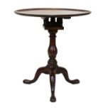 A George III Mahogany Dish-Top Tripod Table, circa 1780, the moulded top pivoting on a birdcage