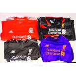 Liverpool Football Club - Four replica shirts, all with Standard Chartered sponsorship,