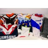 Lot to include a Wests Tigers rugby shirt, size L (bearing signature), a Sydney Roosters XL shirt,