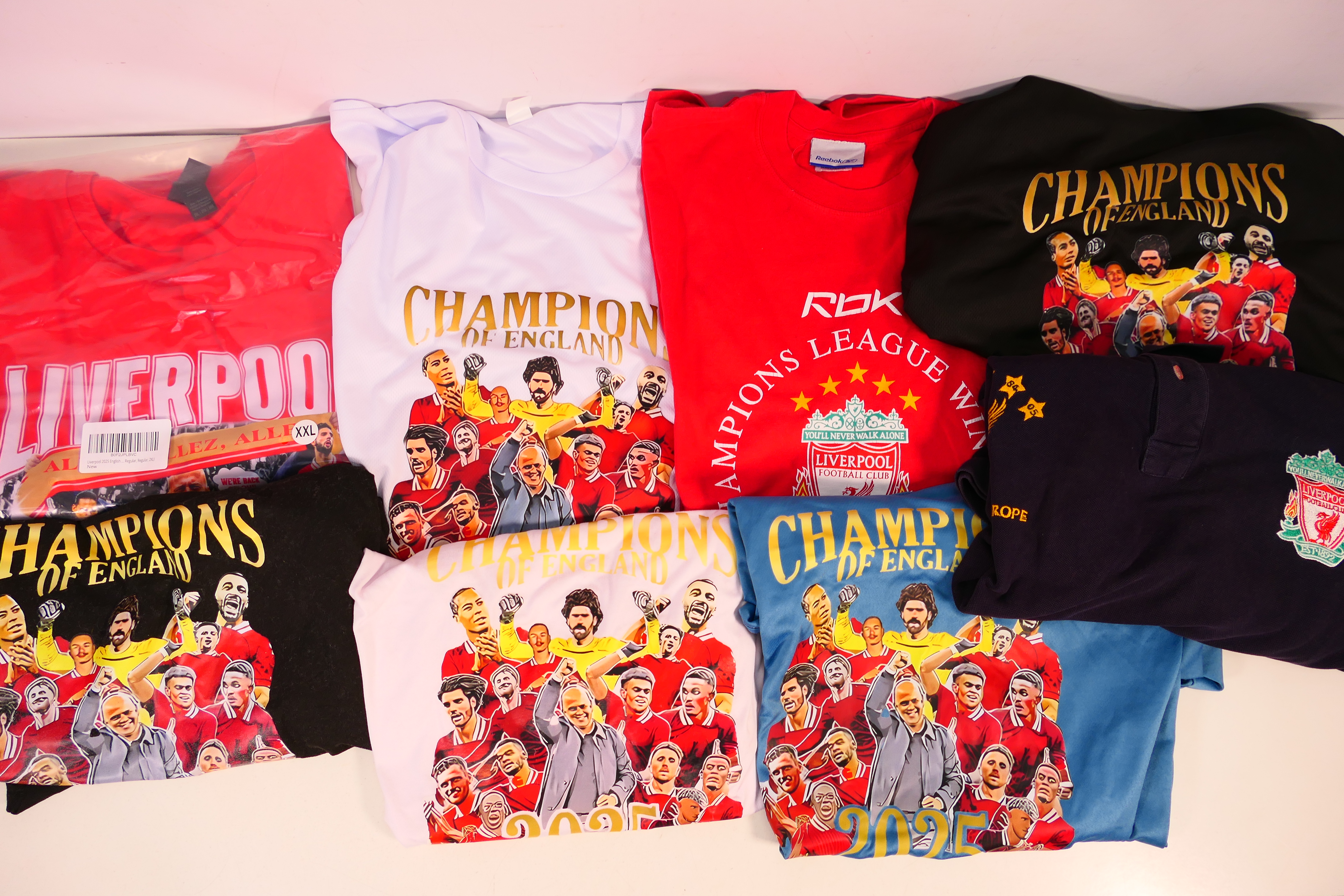 Liverpool Football Club - A collection of T shirts relating to Liverpool,