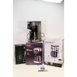 A boxed KitchenBoss 1.