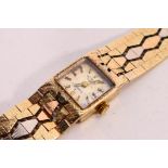 A 9ct gold cased Rotary bracelet wristwatch, London import marks to the case and bracelet,