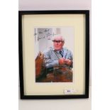James Bond 007 - A signed colour image of Desmond Llewelyn as Q, mounted and framed under glass,