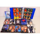 Gerry Anderson - A binder of Cards Inc, Captain Scarlet trading cards and a quantity of DVDs,