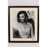 James Bond 007 - A signed black and white image from Goldfinger depicting Pussy Galore,
