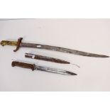 Two bayonets comprising a French M1842 sabre bayonet with 57 cm (l) blade and brass hilt,