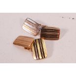 A pair of 9ct rose gold cufflinks with engine turned decoration, Birmingham assay, approximately 5.
