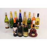 Twelve bottles of wine and similar to include Hennessy XO, Champagne, Chardonnay, Cava,