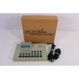 A boxed Cheetah MD8 Digital Drum Machine.