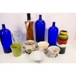 Mixed ceramics and glassware to include a vintage West German vase, blue glass bottles and other.
