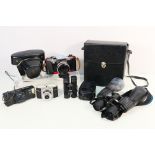 Cameras and binocular to include Canon, Praktica, Ferrania, Tasco and other.