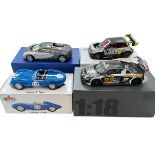 Four assorted model Performance and Rally cars: Bugatti Veyron, Jaguar D Type,