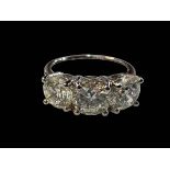 Platinum set three-stone diamond ring, diamonds totalling 2.