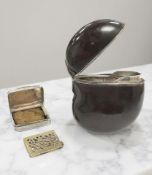 A Victorian silver vinaigrette (the hinged grille a/f), and a silver-mounted seed pod vesta case,