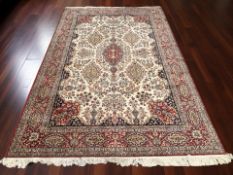 A machine-made carpet of Iranian design,