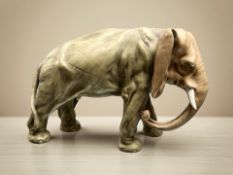 A Royal Dux elephant, length 21 cm.